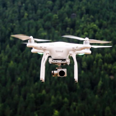 drone flyer over a forest