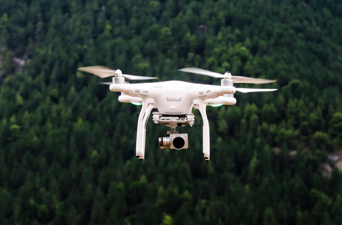 drone flyer over a forest